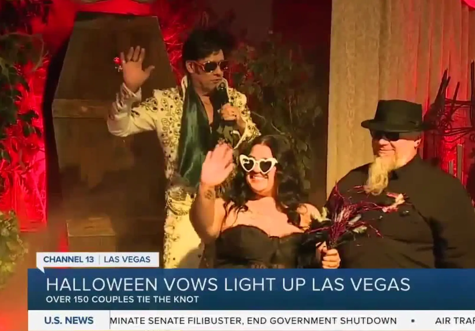 Channel 13 Las Vegas news segment showing a gothic Halloween wedding with an Elvis impersonator at Viva Las Vegas Wedding Chapel, where over 150 couples tied the knot