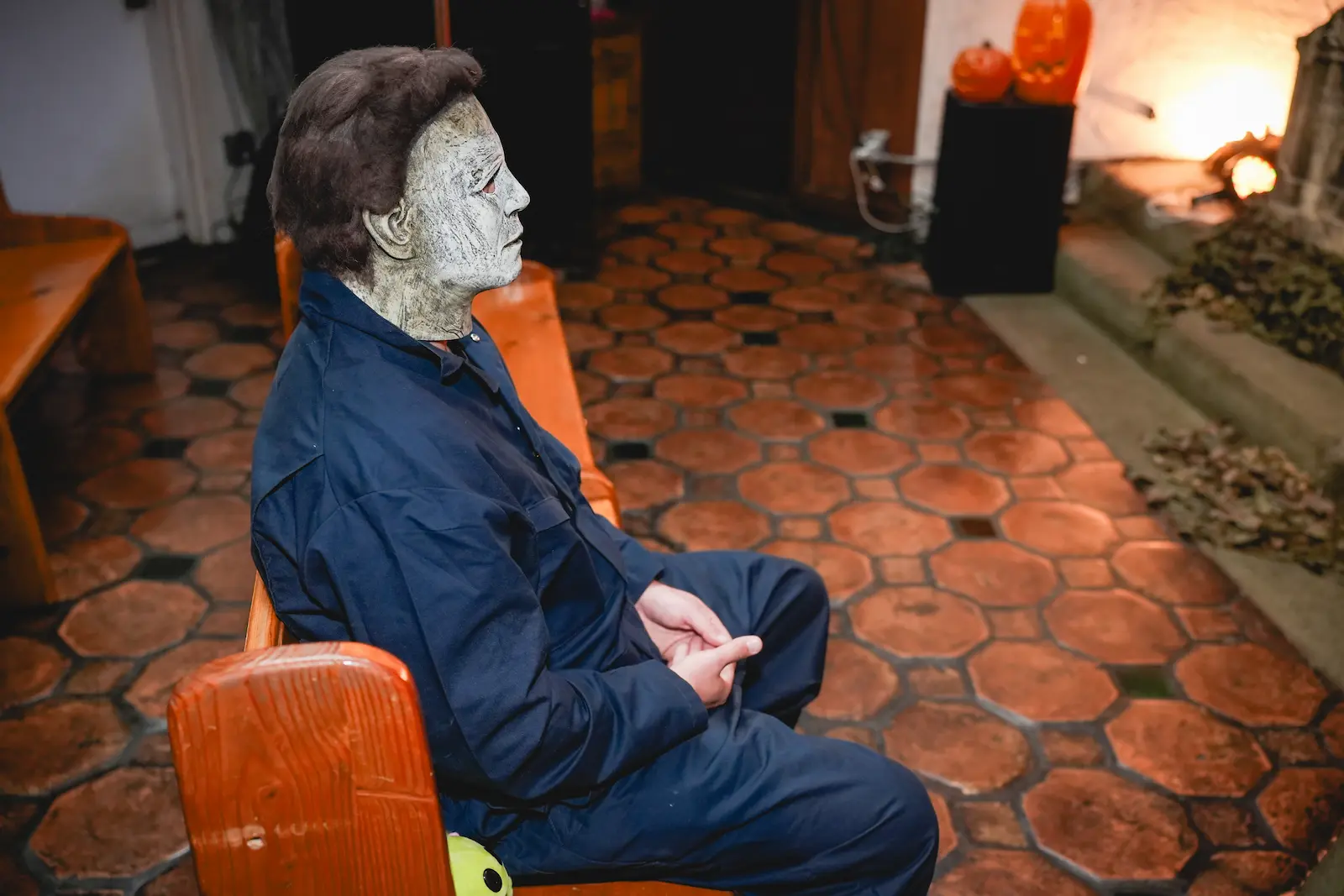 Michael Myers character sitting in a chapel pew at a Las Vegas Halloween wedding venue
