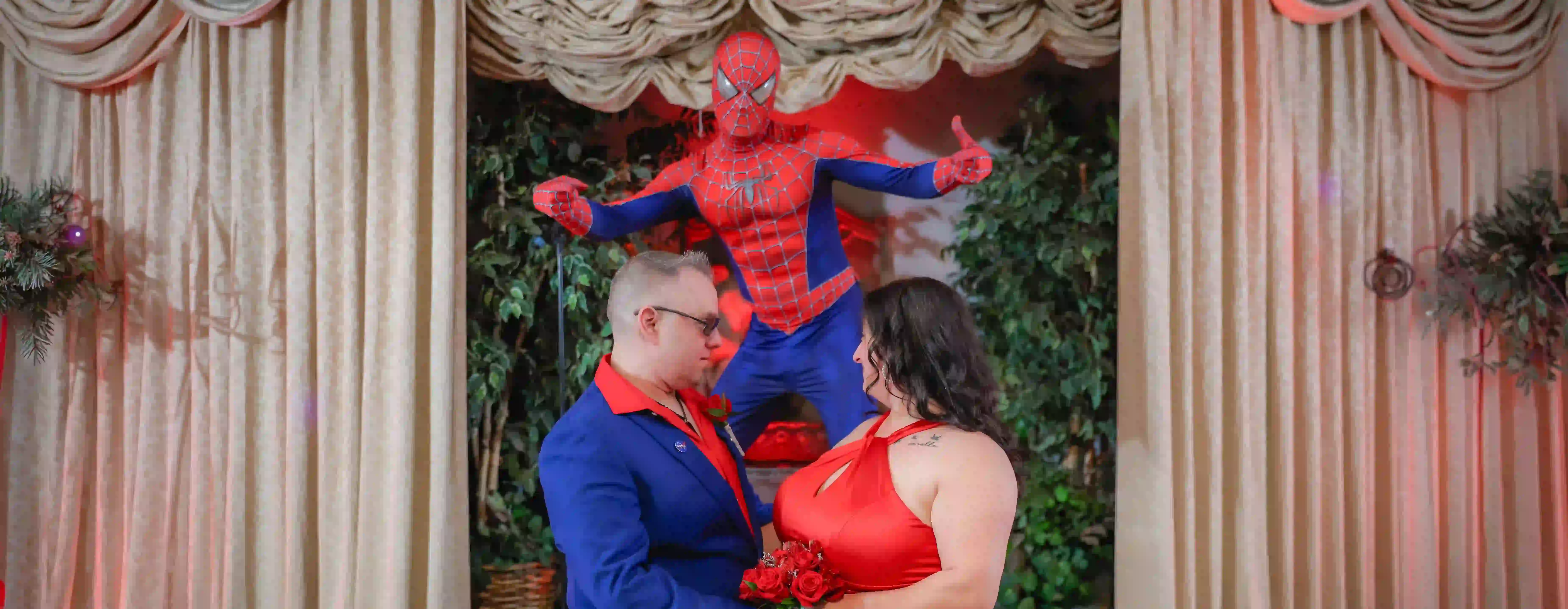 Spiderman entertainer officiates as a couple exchanges vows at a Vegas chapel