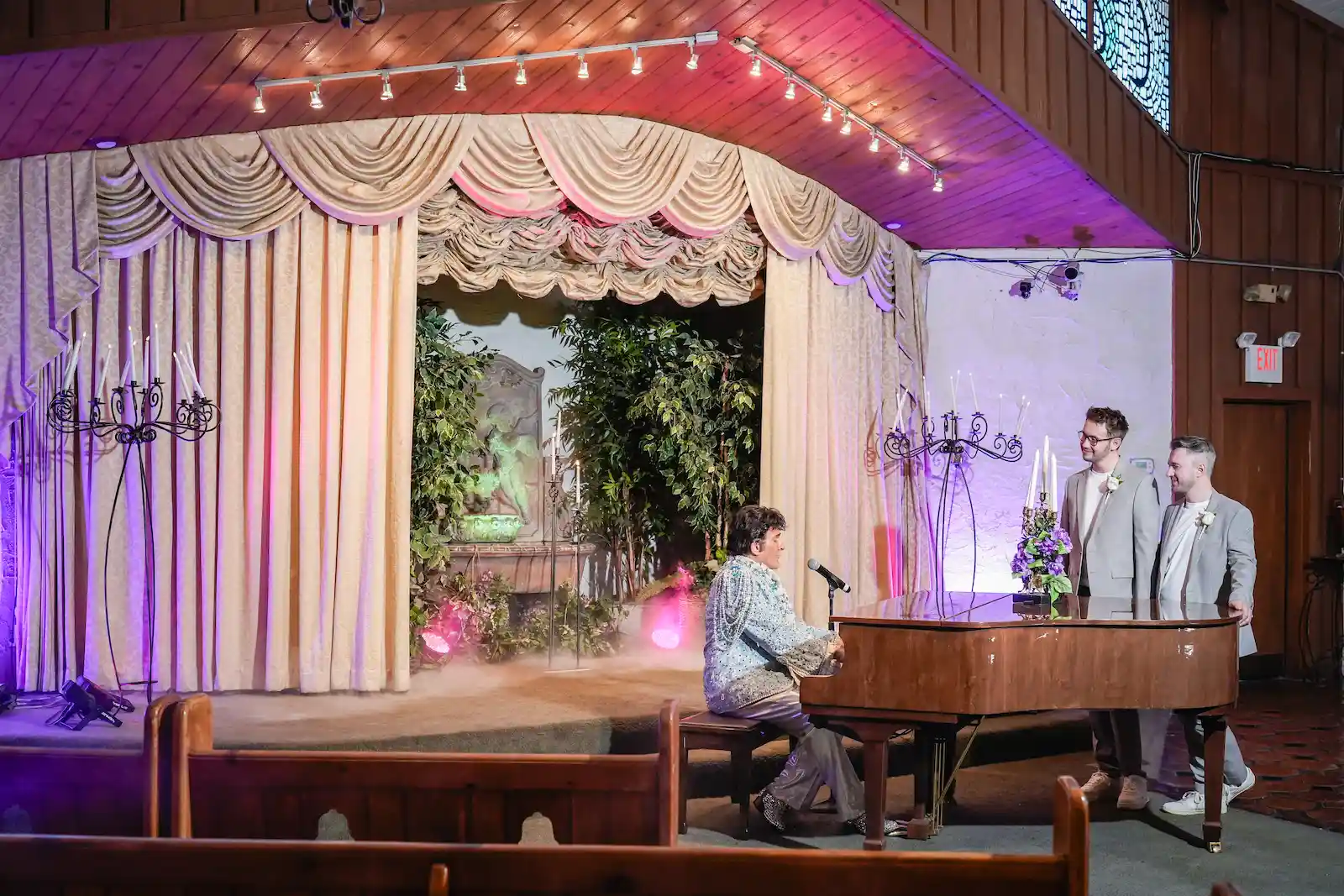 Liberace impersonator playing piano same sex couple wedding ceremony Las Vegas chapel