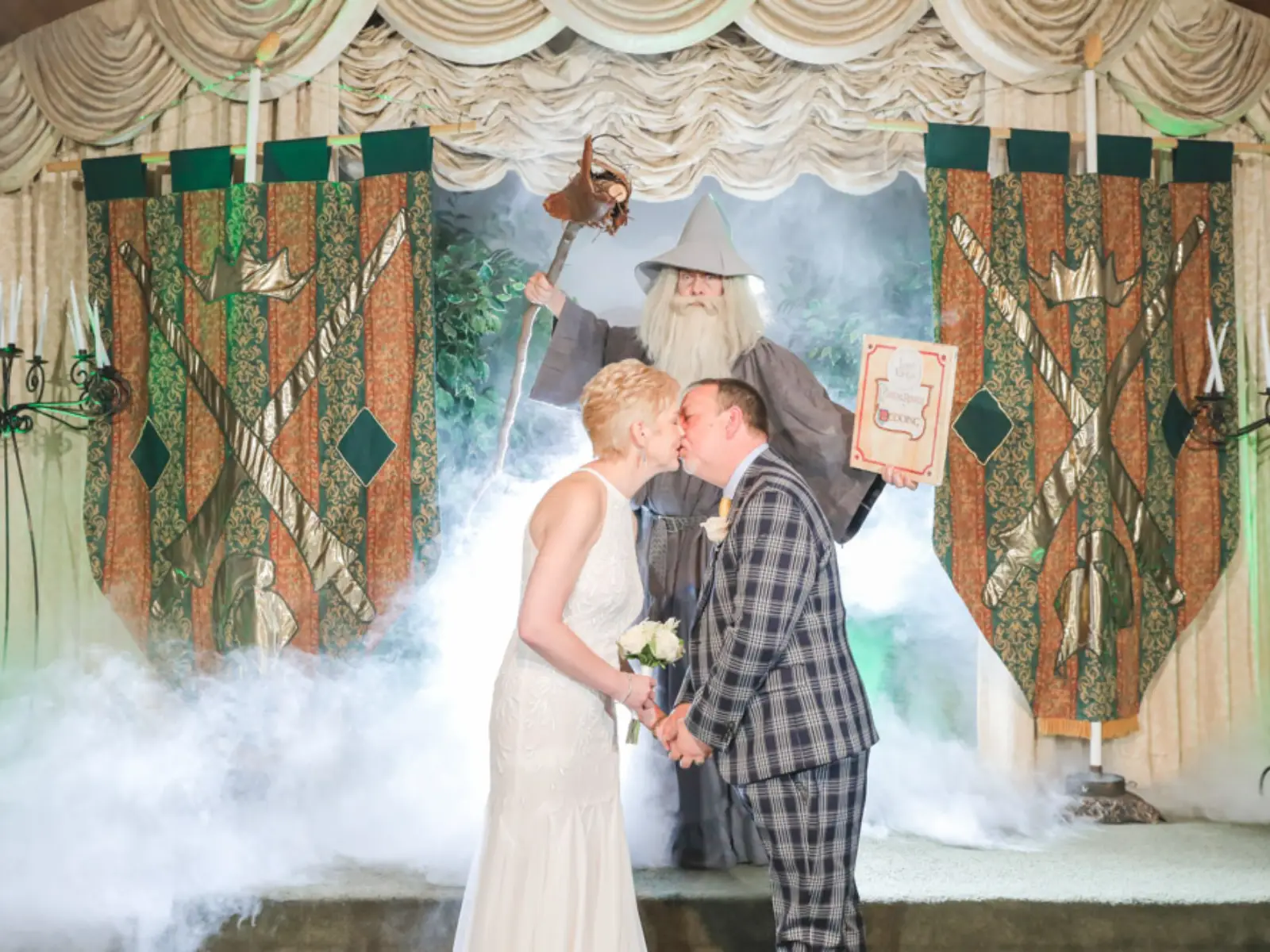 A couple kissing at the altar during a fantasy-themed wedding ceremony officiated by a wizard in Las Vegas. Harry-Potter-Wedding.webp	wizard-fantasy-wedding-ceremony-las-vegas.webp