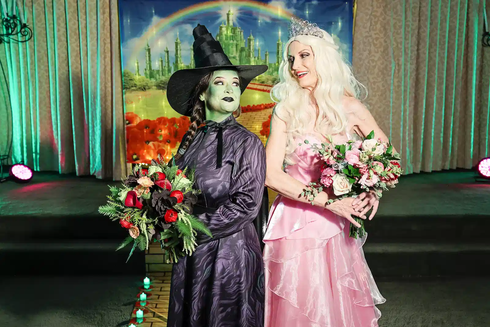 Wicked Witch Glinda impersonators bouquets Emerald City backdrop Las Vegas wedding chapel