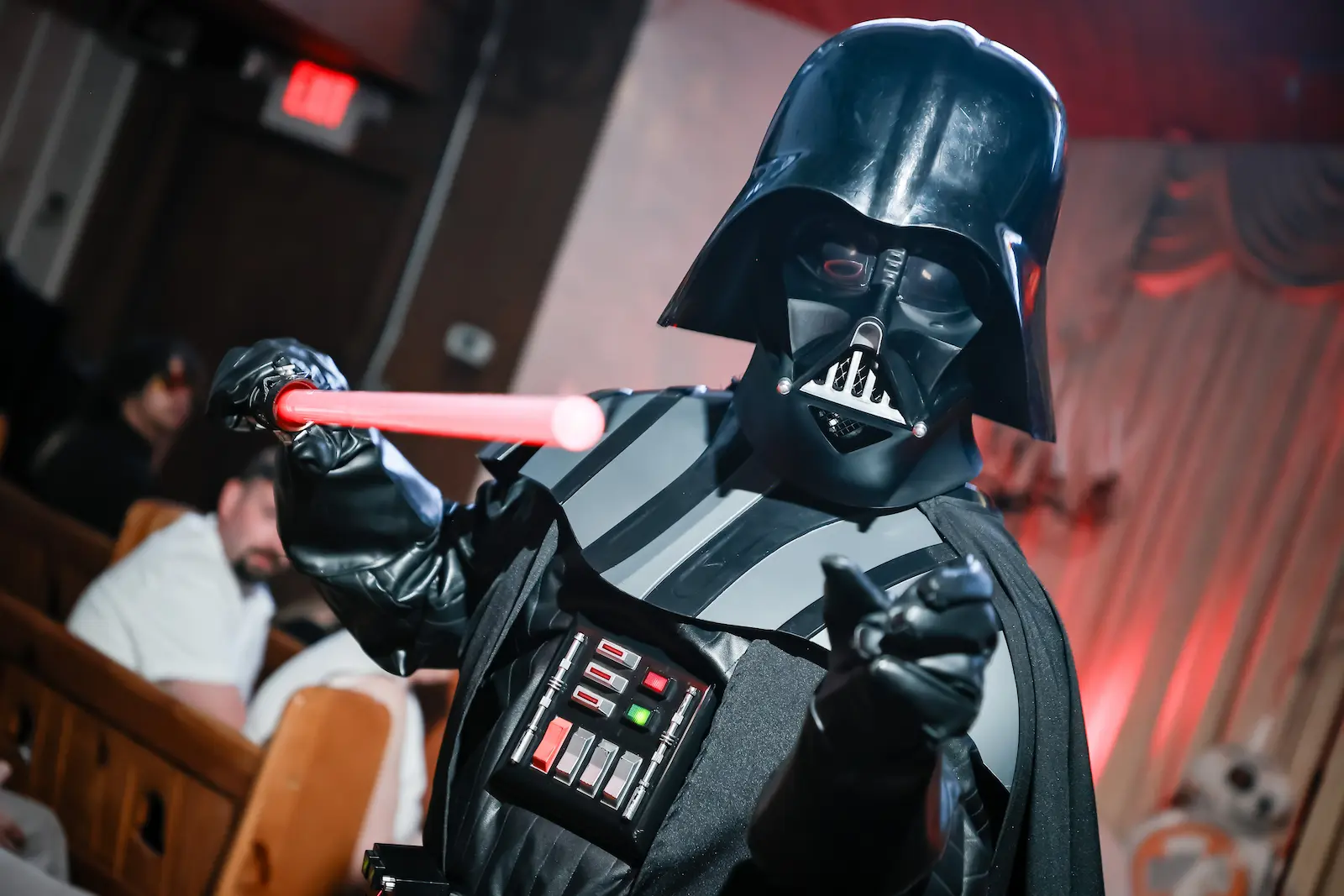 Darth Vader character holding a red lightsaber inside a Las Vegas wedding chapel