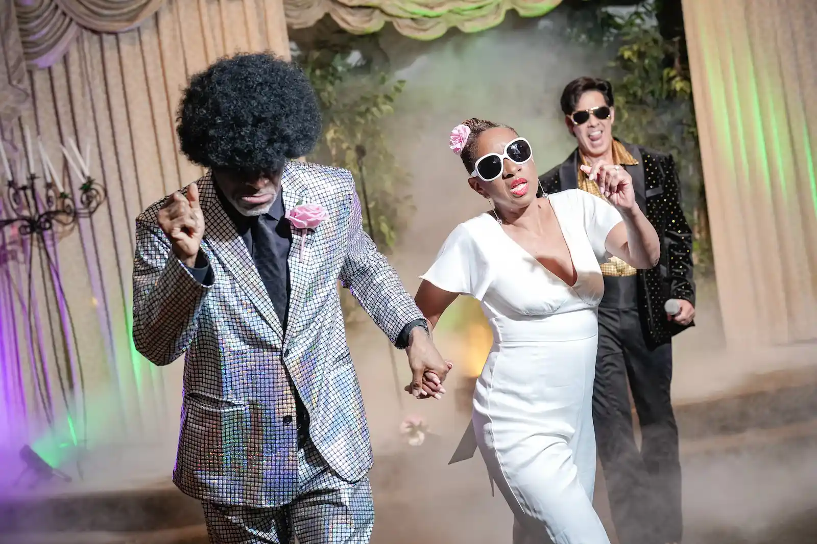 disco themed wedding couple silver sequin suit afro sunglasses dancing Las Vegas chapel