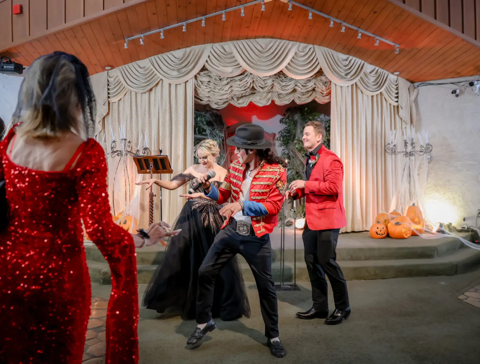 michael jackson impersonator performing during themed wedding ceremony with bride and guests