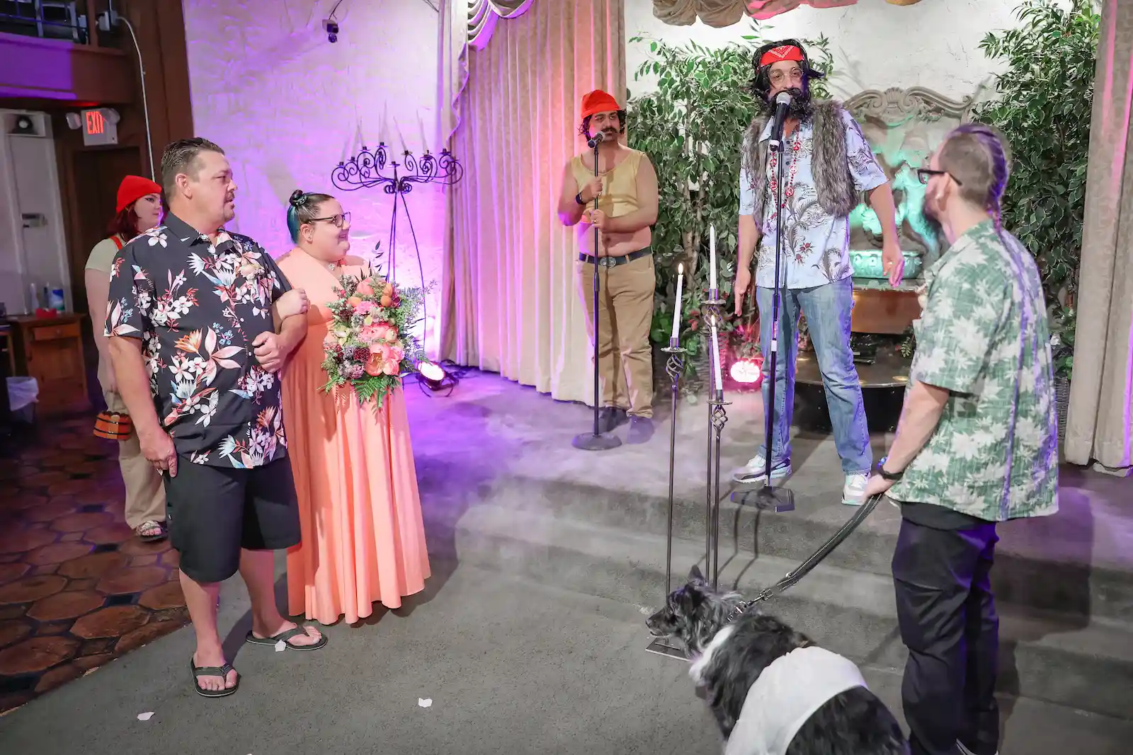 Couple exchanges vows as Cheech and Chong impersonators officiate their themed wedding ceremony at Las Vegas chapel