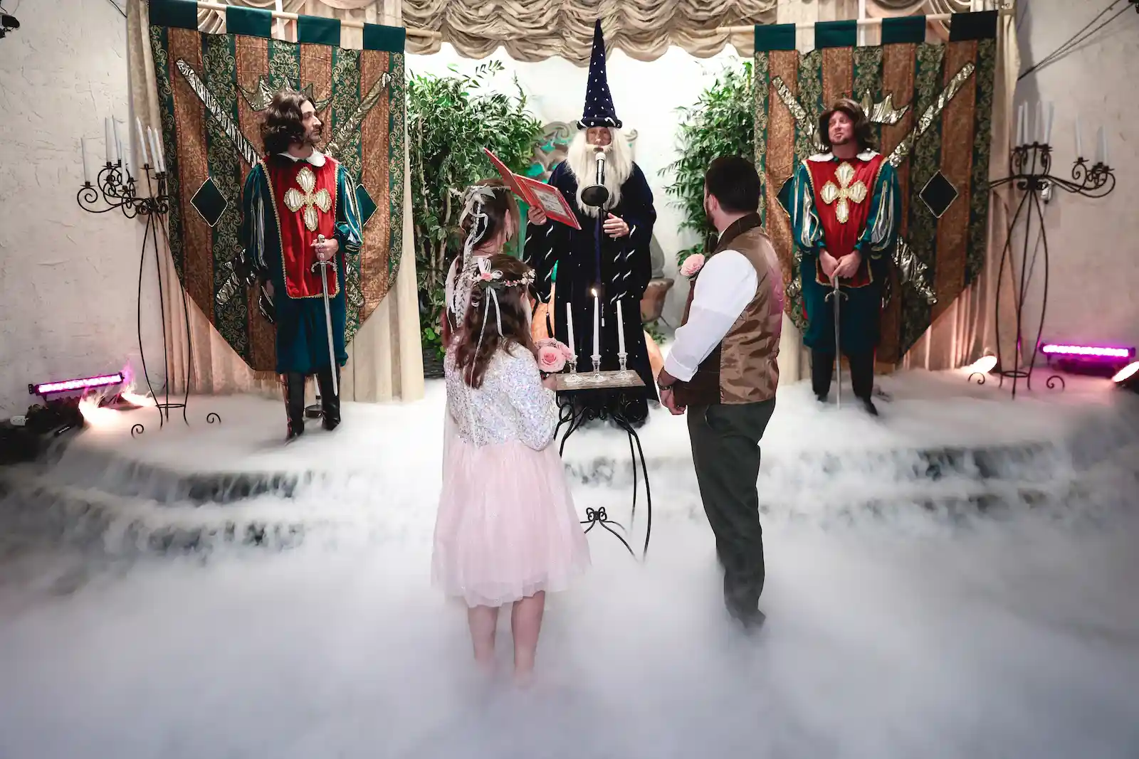 fairy tale wedding couple dry ice fog royal guards wizard officiant chapel