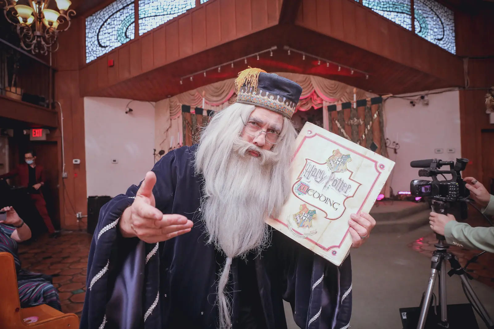 Dumbledore lookalike wizard officiant Harry Potter wedding book Las Vegas chapel