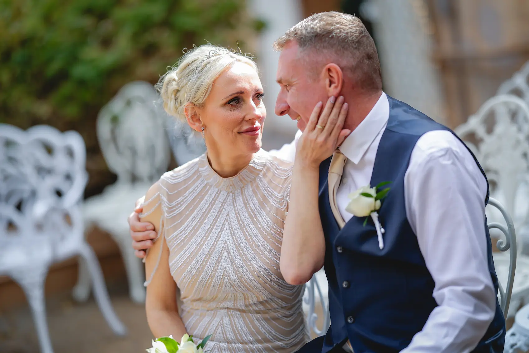 Bride tenderly holding groom