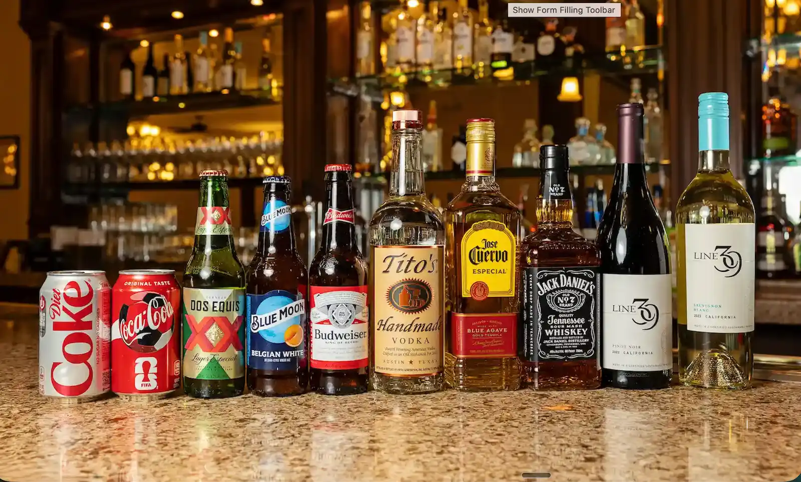Full open bar selection of beer, spirits, and wine including Dos Equis, Tito